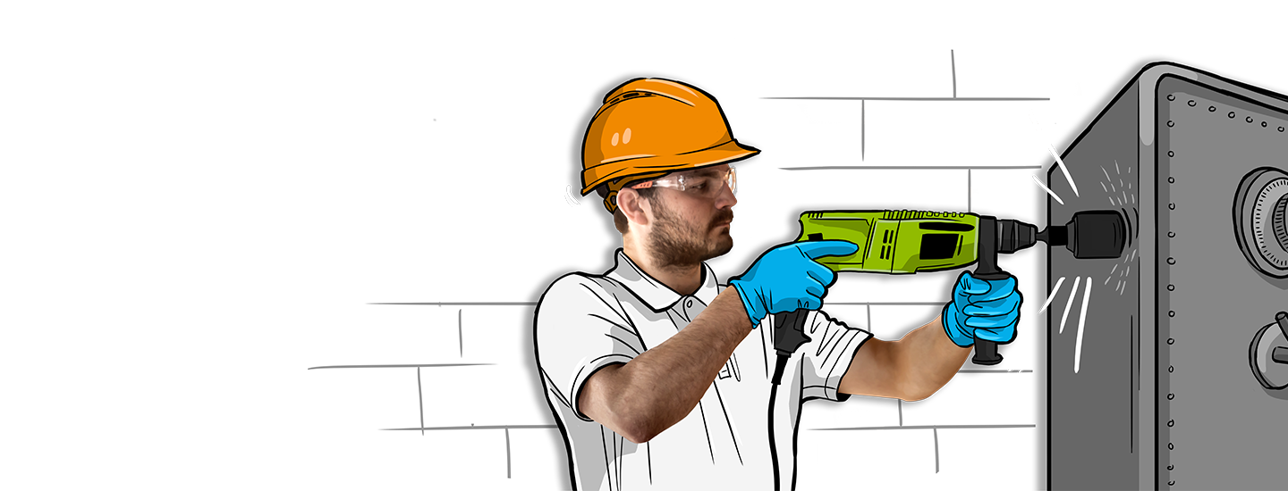 Handwerker mit einem Bohrhammer und Tresor